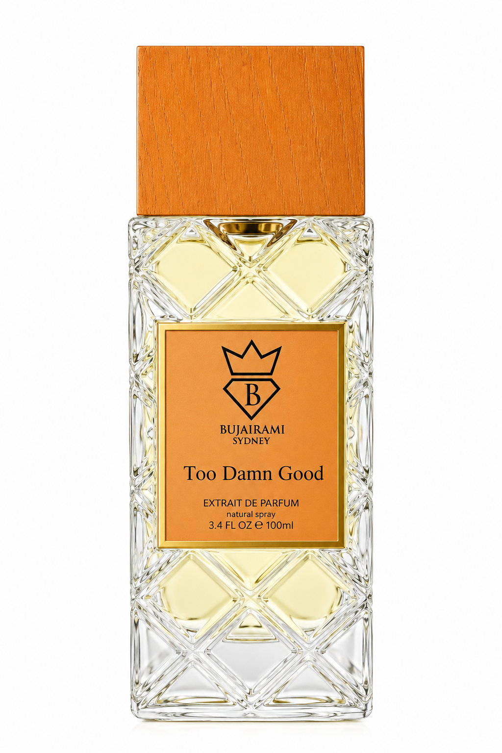 Bujairami Too Damn Good 100ml Extrait de Parfum, presented in its tall faceted crystal-style bottle with pale golden fragrance, warm orange textured cap and matching orange-and-gold label, isolated on a pristine white background.