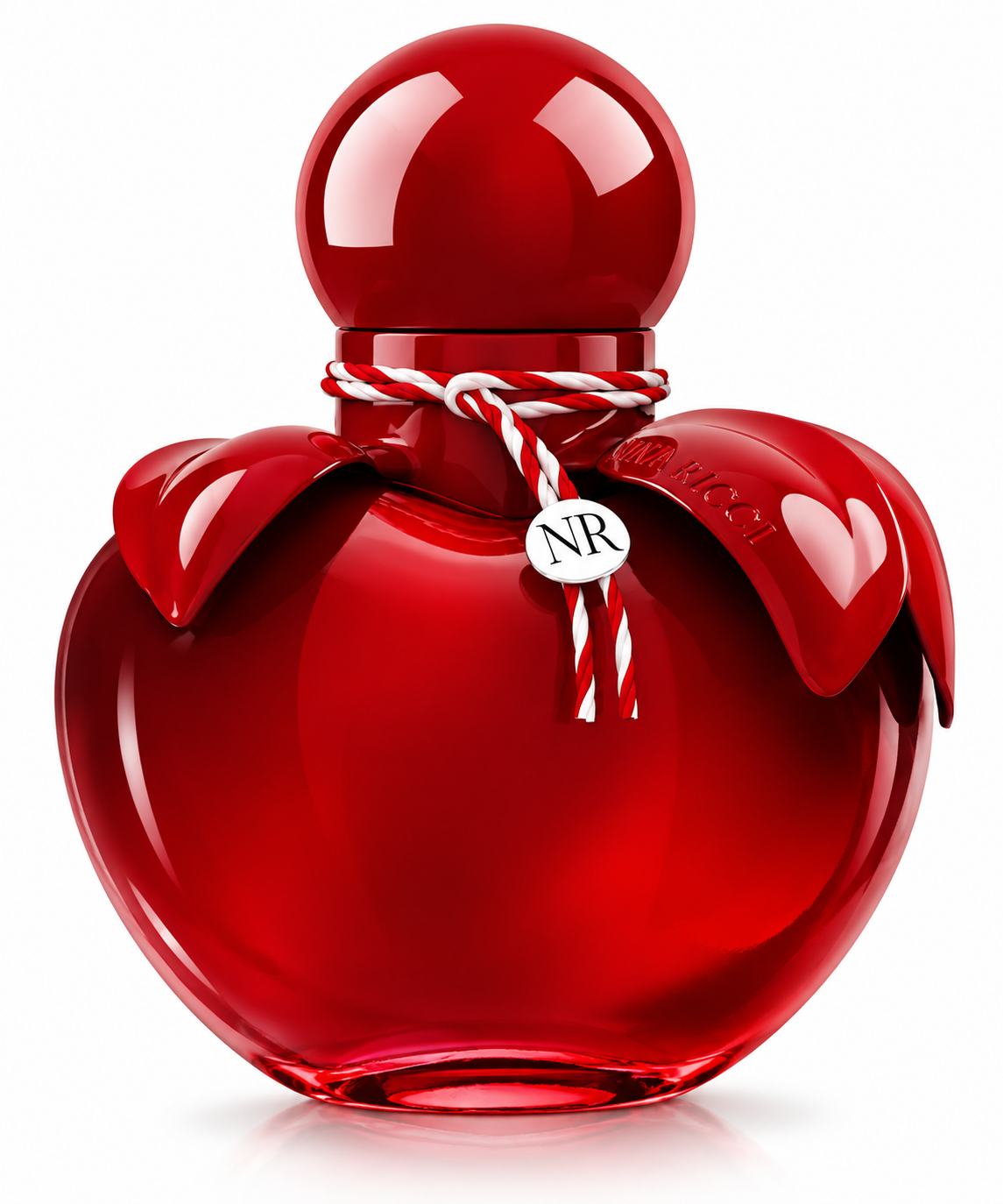 Nina Ricci Nina Rouge perfume in a glossy red apple-shaped bottle with signature leaf details, red and white cord and NR charm, presented on a clean white background.