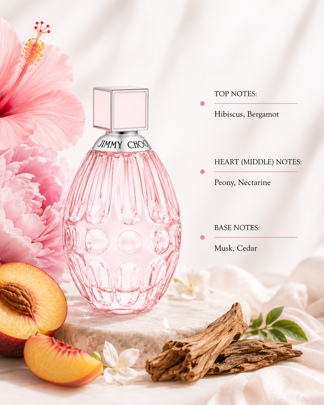 Jimmy Choo L'Eau 40ml Eau de Toilette presented with hibiscus, peony, nectarine, bergamot and cedarwood accents, capturing its delicate floral-fruity character in a bright, elegant setting.