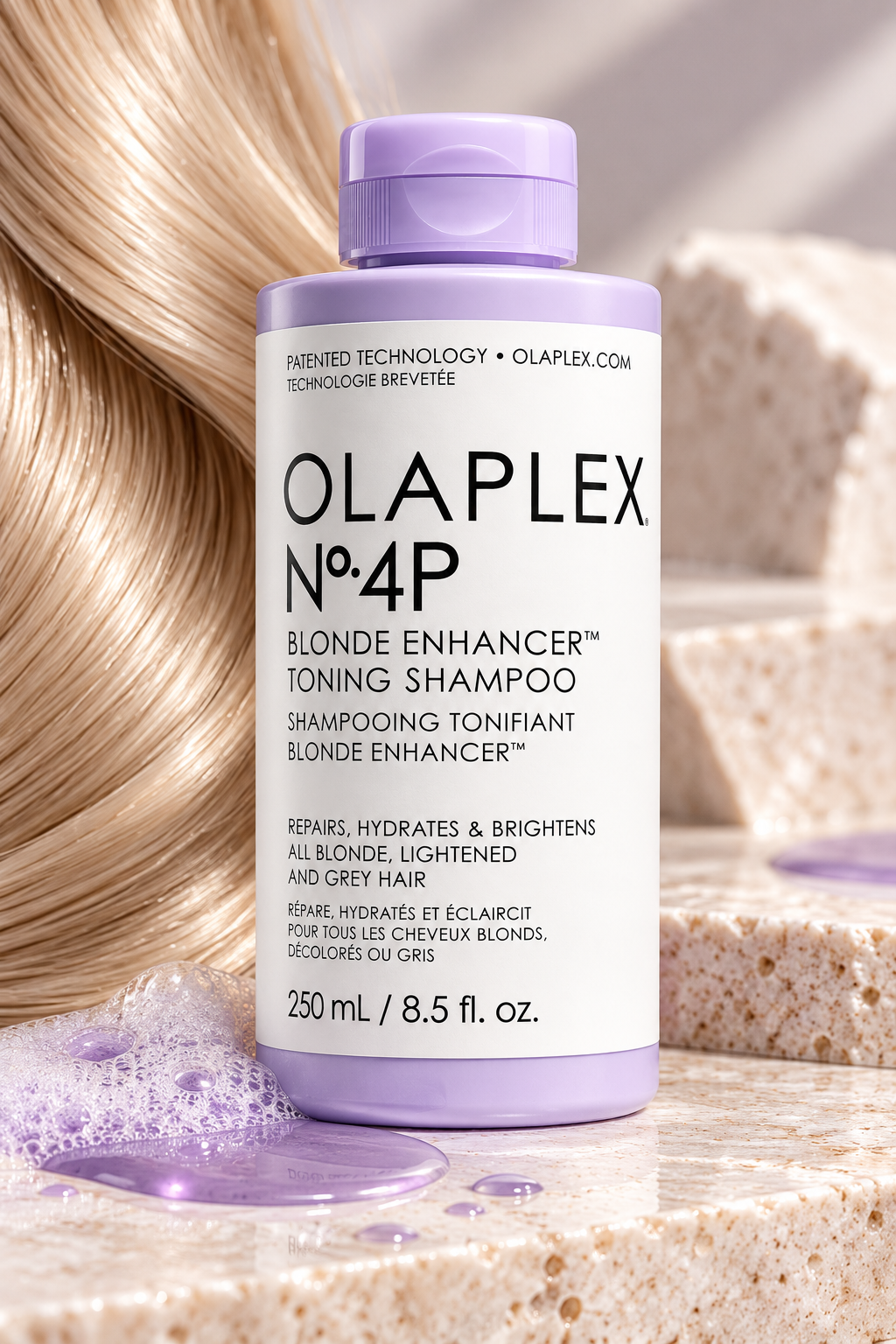 OLAPLEX No.4P Blonde Enhancer Toning Shampoo 250ml displayed with glossy blonde hair and purple shampoo texture, highlighting its brightening, hydrating and toning care for blonde, lightened and grey hair.