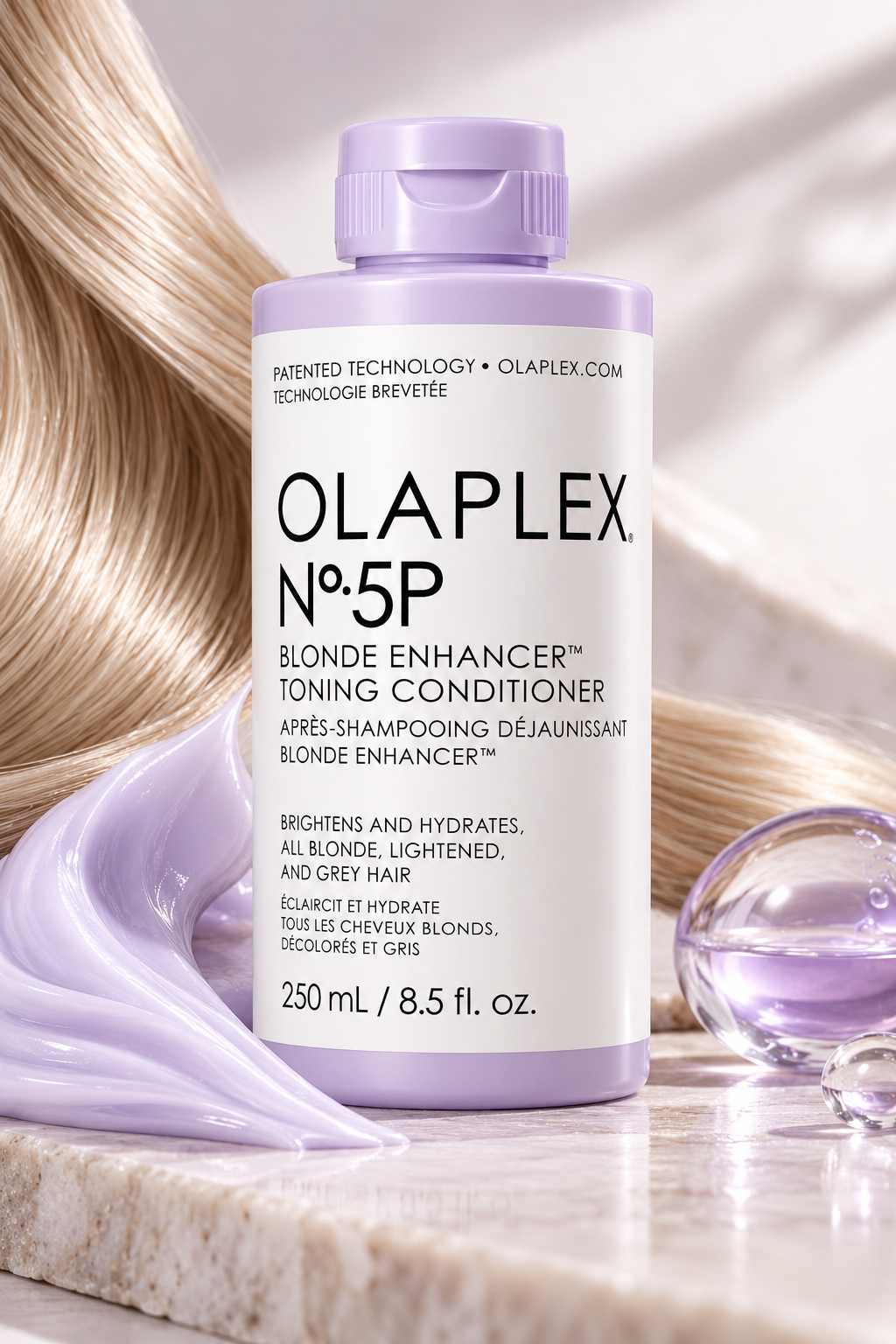 OLAPLEX No.5P Blonde Enhancer Toning Conditioner 250ml displayed with glossy blonde hair and lavender-toned cream, highlighting its brightening, hydrating and toning haircare formula.